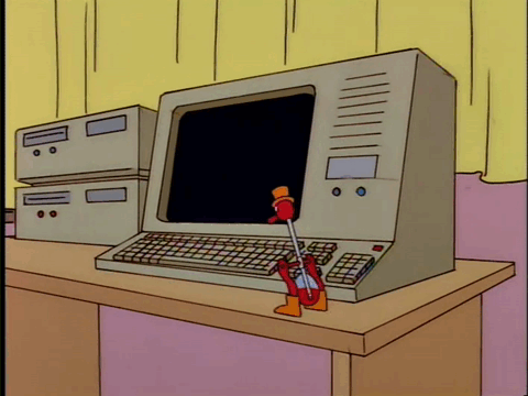 A drinking bird pressing a button on a keyboard