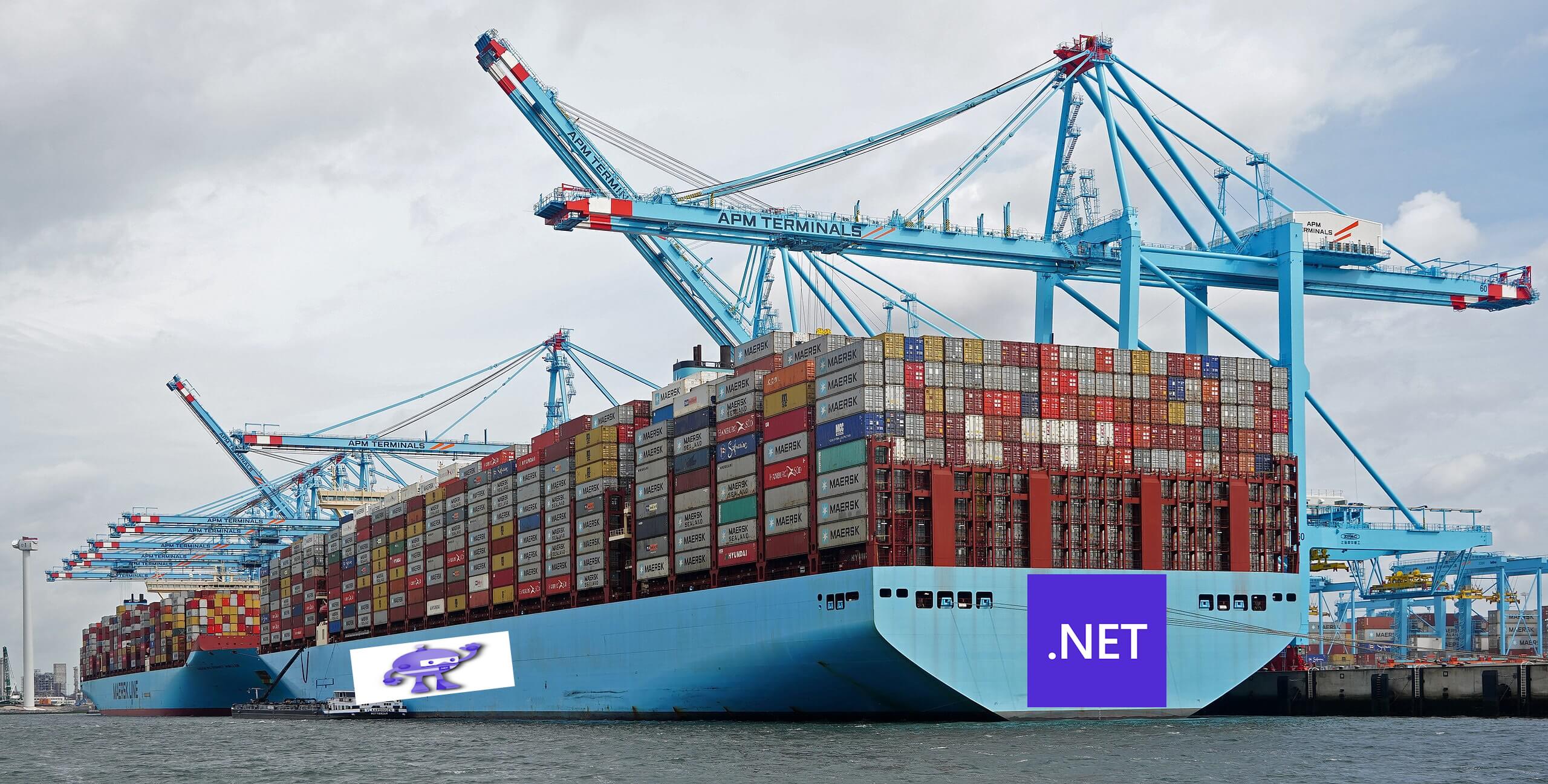 A container ship being loaded with the .NET logo on the stern